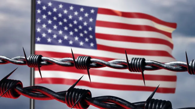 barbed wire and american flag